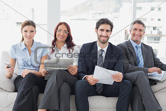 Business team reviewing work notes