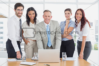 Business people smiling at camera