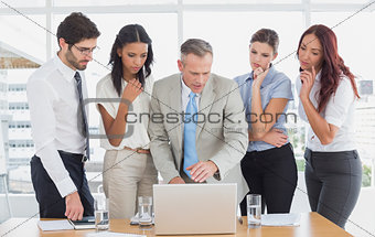 Business team using a laptop