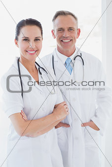 Doctors smiling and working together