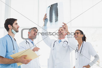 Doctor holding up an x-ray