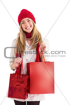 Pretty blonde holding shopping bags