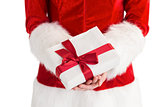 Sexy santa girl holding gift