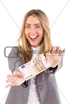 Stylish blonde showing fifty euro note