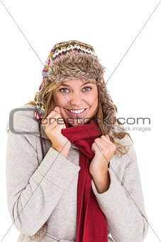 Happy blonde in winter clothes
