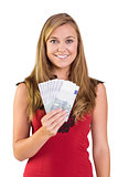 Pretty blonde showing wad of cash