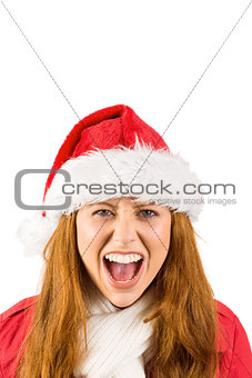 Festive redhead shouting at camera