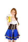 Oktoberfest girl smiling at camera holding beer