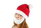 Pretty redhead in santa hat and beard
