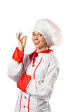 Pretty chef standing with arms crossed