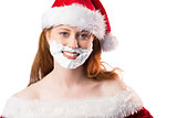 Festive redhead in foam beard