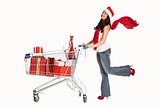 Woman standing with shopping trolley