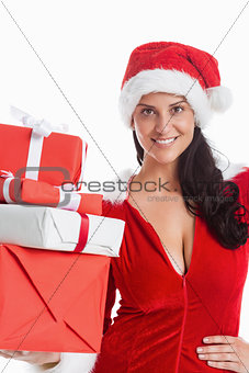 Woman smiling with christmas presents