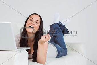 Woman ordering shopping from online