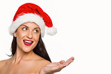 Woman wearing santa hat