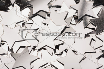 Many silver star decorations background