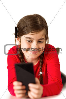 Cute little girl using smartphone