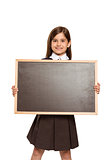 Cute pupil showing chalk board