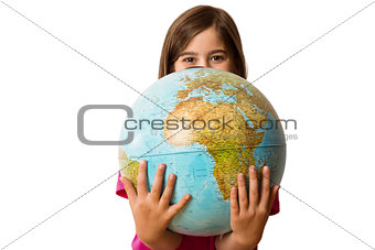 Cute pupil smiling holding globe