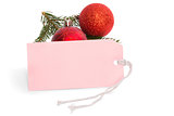 Pink tag with christmas decorations