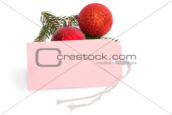 Pink tag with christmas decorations