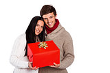 Young couple holding a gift