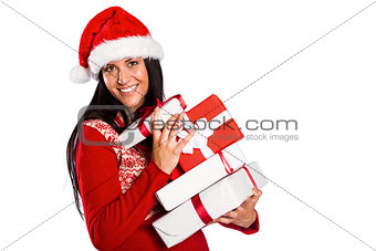 Young brunette with many christmas presents