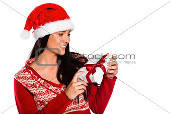 Young brunette with christmas present