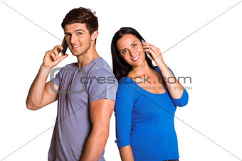 Young couple talking on their phones