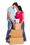 Young couple with moving boxes