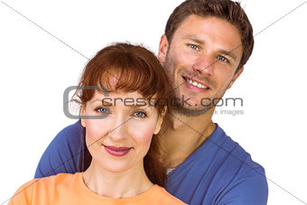 Happy couple looking at camera