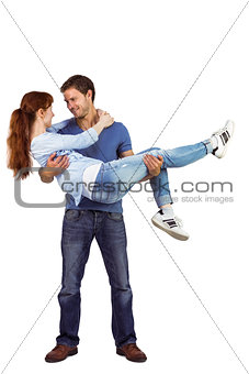 Man lifting up his girlfriend
