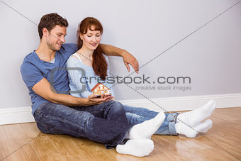 Couple using tablet at home