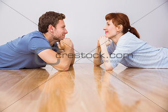 Couple lying on the floor