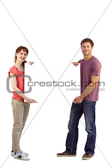 Couple holding a white sign