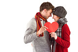 Couple holding a red heart