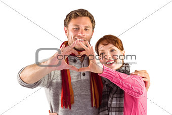 Couple making a heart shape