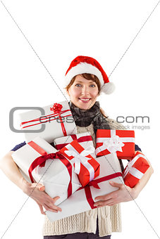 Woman holding lots of presents