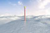 Snowy landscape with pole