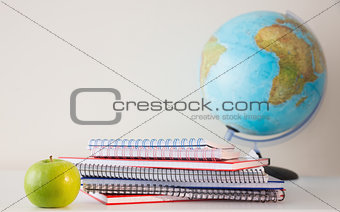Stack on notepads on table