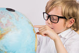 Student learning geography with globe
