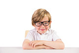 Smiling student sitting with glasses
