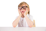 Worried student sitting with glasses