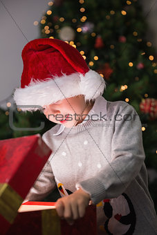 Child opening his christmas present