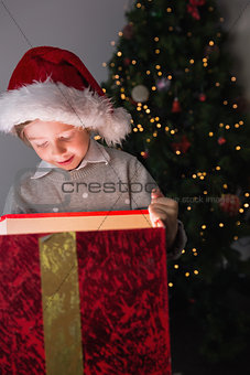 Child opening his christmas present