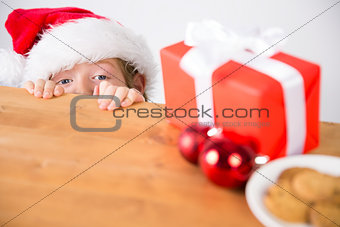 Child looking at christmas present
