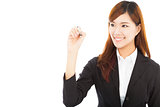confident business woman standing and holding a pencil
