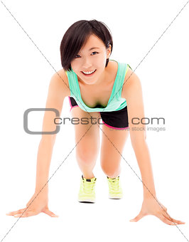 happy female athlete ready to run over white background 