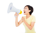 young woman holding megaphone over white background