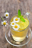 Chamomile tea in a glass cup 